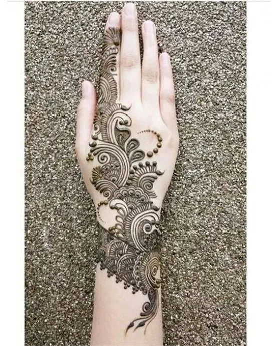 Butterfly Crescent Framework Using Back Hand Mehndi Design Butterfly Crescent Framework Using Back Hand Mehndi Design